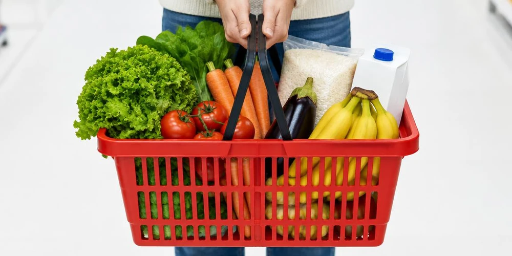 Fresh groceries in a red pickup basket